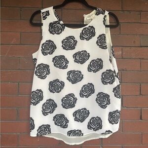 White sleeveless blouse with black roses